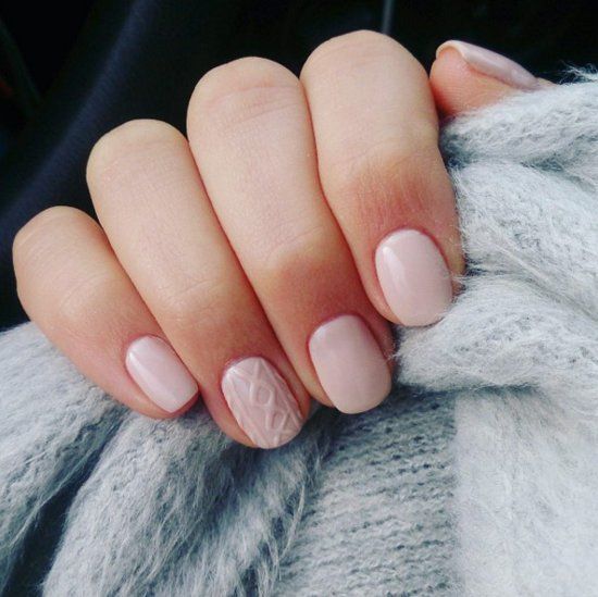 cream color nails with sweater design