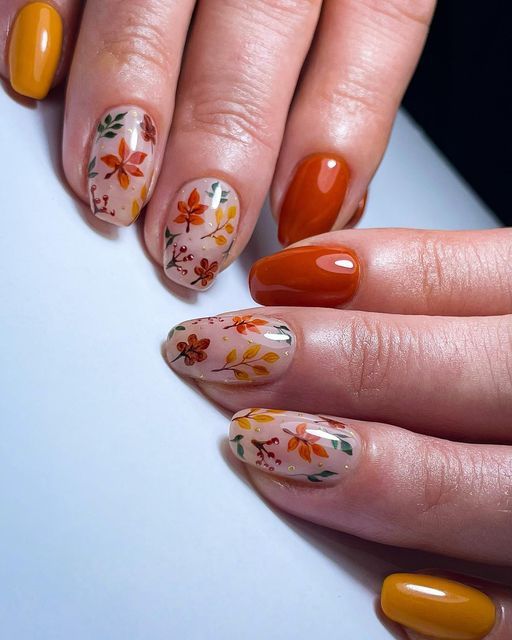 Orange autumn leaves nail art 