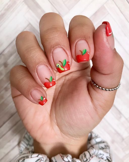 apple-themed nail design