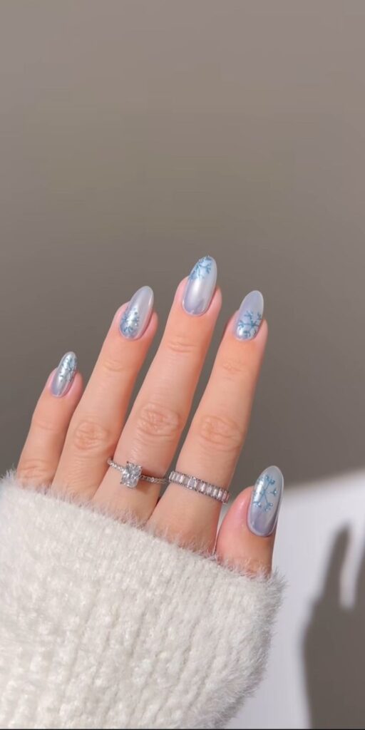 Frosty Blue Chrome Nails with Snowflakes