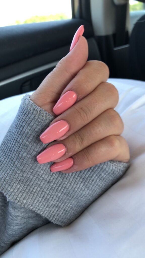 Coral pink nails